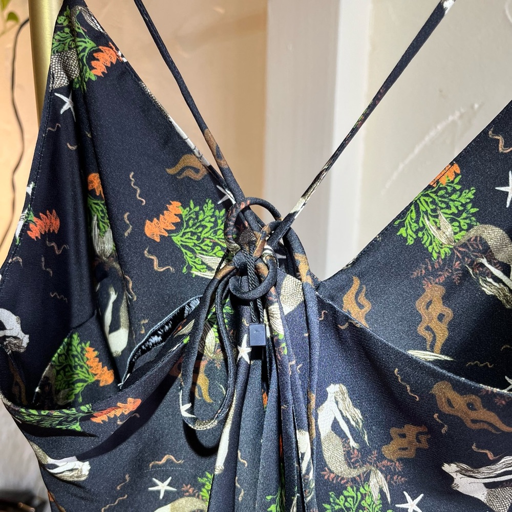 Silky Zara mermaid mini dress with adjustable straps and modern design